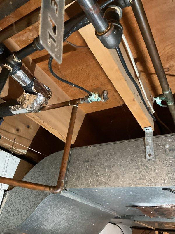 Performed annual maintenance on 9-year-old EnergiAir furnace system (warranty expires 01-2027). Inspected ductwork including seasonal dampers marked "SUMMER"/"WINTER" and verified proper humidifier operation. Completed standard tune-up procedures on furnace with last comprehensive maintenance documented in 2021. Noted client has active home warranty coverage.