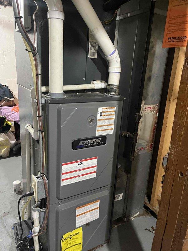 Completed annual heating maintenance on 13-year-old Energy Elite Series furnace. Performed standard tune-up procedures including inspection of heat exchanger, burners, and electrical connections. System is operating within normal parameters with no humidity control issues. Verified proper venting through PVC exhaust system.