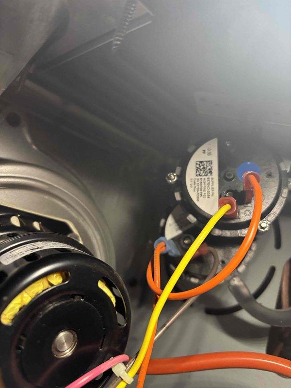 Diagnosed furnace issue preventing system from exceeding 60°F. Performed inspection of pressure switch and electrical components, taking voltage readings with EM201B meter. Determined proper function restored after servicing the recently installed (2023) equipment.