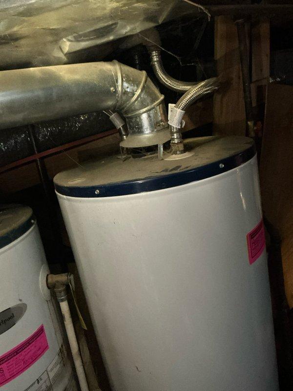 Completed estimate for dual AC unit replacement in a duplex property. Assessed existing HVAC systems with furnace located in basement for lower unit and in attic for upper unit. Documented current equipment condition with photos and evaluated space for potential mini-split installation as an alternative solution.