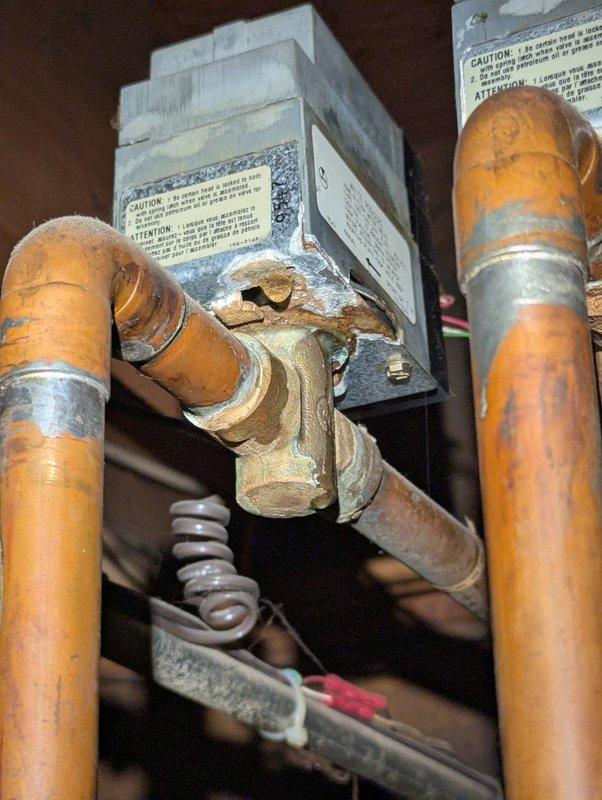 Responded to service call regarding boiler expansion tank installation. Inspected aging boiler system with extensive copper piping network showing significant oxidation and corrosion at connection points. Successfully installed new expansion tank, integrated it with the existing system, and verified proper system pressure and operation.
