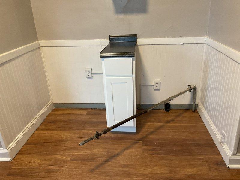 Successfully installed new gas lines for both stove and dryer locations. Properly routed gas piping along baseboard area with appropriate connections to existing gas supply. All connections were pressure tested to verify system integrity and ensure safe operation of appliances.