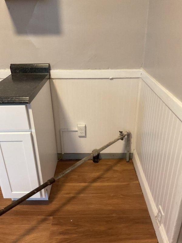 Successfully installed new gas lines for both stove and dryer locations. Properly routed gas piping along baseboard area with appropriate connections to existing gas supply. All connections were pressure tested to verify system integrity and ensure safe operation of appliances.