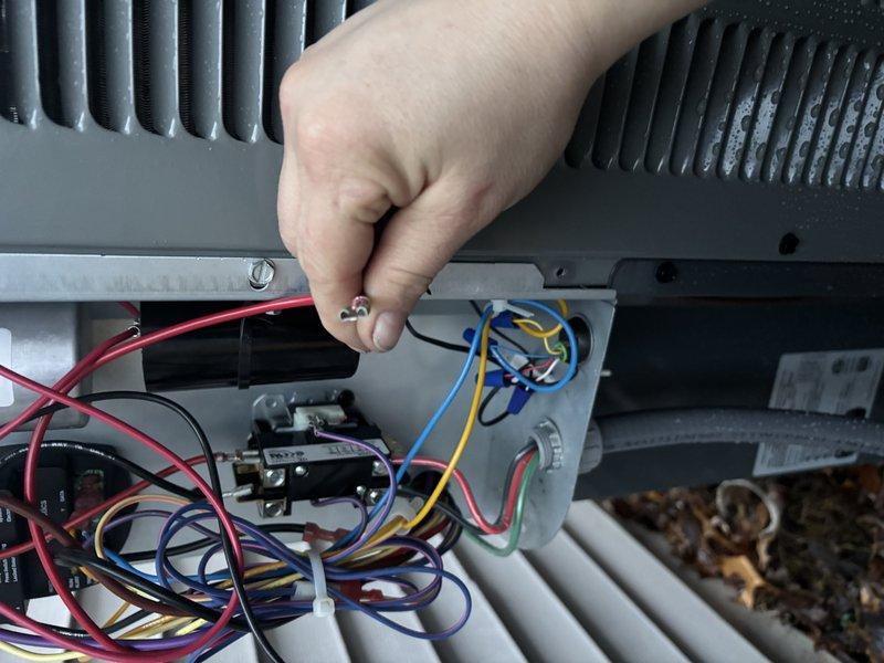 Responded to no-heat service call for 4-month-old EnergiAir WT 10-2035 system that was completely non-operational despite having power. Diagnosed loose wiring connections at the control board terminal block and repaired by securing all connections properly. System now functioning correctly with proper heating operation verified.