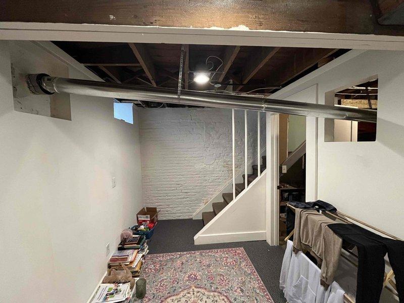 Diagnosed 10-year-old US/Craftmaster water heater that was not lighting. Inspected gas control valve and thermocouple, finding significant corrosion and mineral buildup affecting ignition system. Cleaned connections, replaced thermocouple, and verified proper operation after repair with successful ignition and consistent flame.