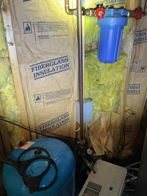 Responded to basement flooding caused by floor drain backup. Inspected plumbing system, including water pressure tank and associated piping in utility area. Cleared main drain line obstruction using professional equipment, restoring proper drainage function and preventing further water intrusion.