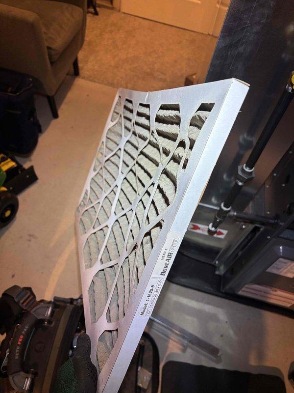 Performed complimentary annual tune-up on 1-year-old EnergiAir furnace (model WT 01-2034). Replaced heavily soiled air filter and inspected thermostat wiring connections to ensure proper operation. System is now functioning optimally with clean filter installed.