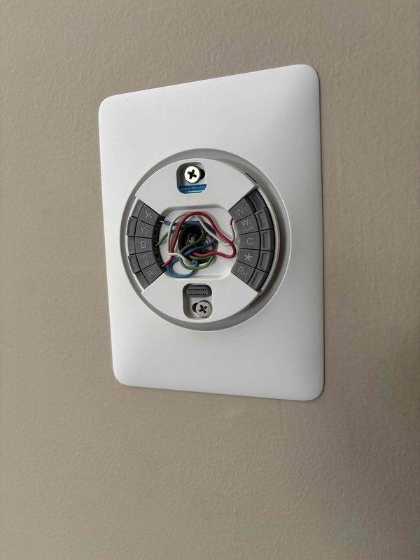 Performed complimentary annual tune-up on 1-year-old EnergiAir furnace (model WT 01-2034). Replaced heavily soiled air filter and inspected thermostat wiring connections to ensure proper operation. System is now functioning optimally with clean filter installed.