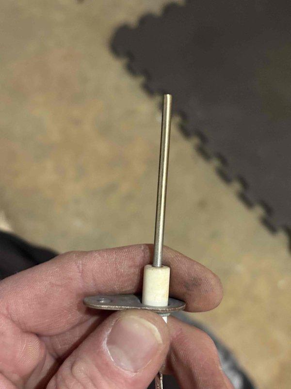 Performed annual heating maintenance on 16-year-old Goodman furnace. Replaced corroded flame sensor that showed significant oxidation. System now operating properly with no issues identified.