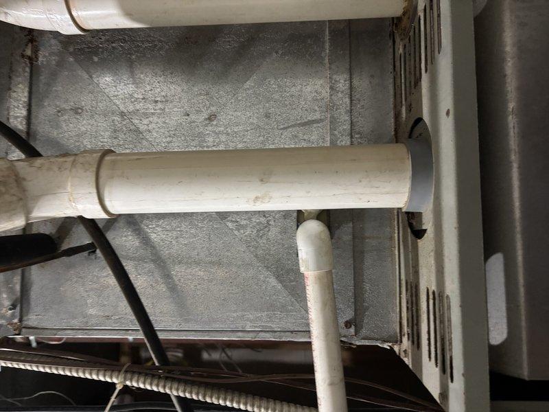 Completed FSTU on aging furnace and water heater systems. Inspected plumbing infrastructure including PVC piping connections and metallic components, noting some discoloration and minor corrosion at connection points. Examined mechanical control unit with attached information plate and verified proper integration with the existing HVAC system.