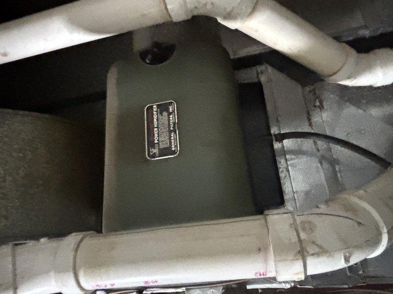 Completed FSTU on aging furnace and water heater systems. Inspected plumbing infrastructure including PVC piping connections and metallic components, noting some discoloration and minor corrosion at connection points. Examined mechanical control unit with attached information plate and verified proper integration with the existing HVAC system.