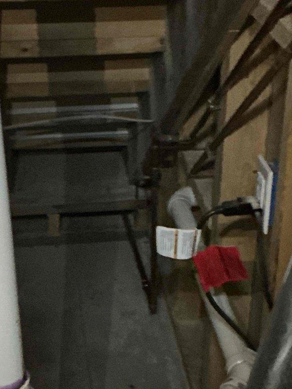 Conducted comprehensive water softener assessment in client's utility area with exposed ceiling joists and plumbing infrastructure. Evaluated existing water system components, including copper and PVC piping, to determine appropriate softener specifications. Documented installation environment and provided client with detailed estimate for water softener solution as requested.