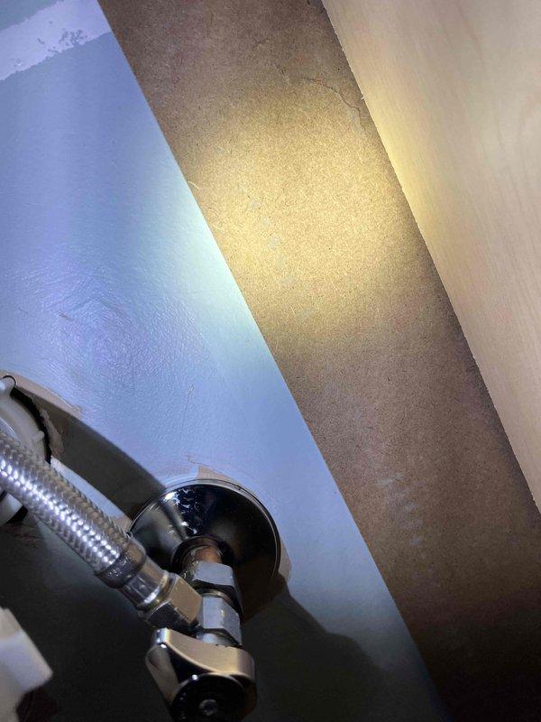 Replaced faulty sink shut-off valves and installed new P-trap assembly to address slow cold water flow and suspected leak. Verified proper water flow and leak-free operation after installation.