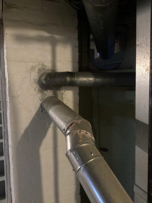 Responded to leak complaint on 10-year-old water heater. Inspection revealed corrosion at pipe joint causing seepage. Replaced damaged section of plumbing and verified proper operation of water heater system.