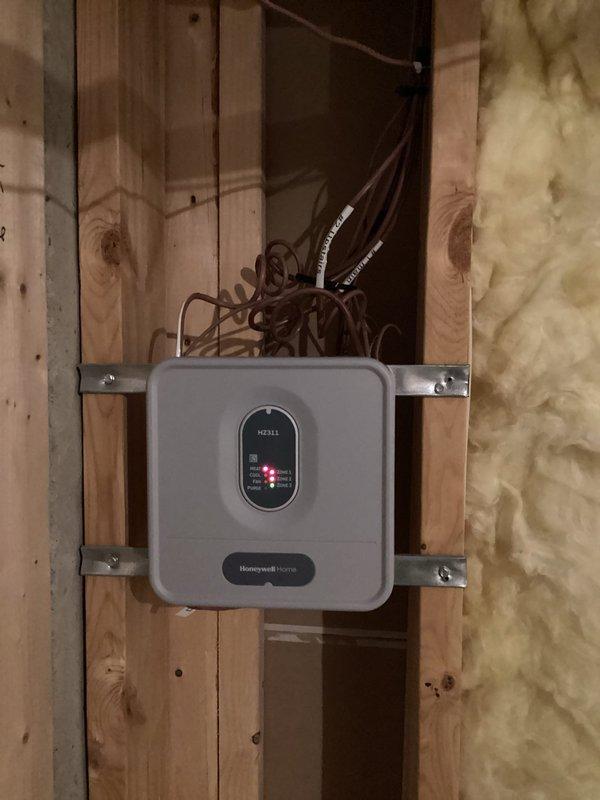 Performed diagnostic assessment on 10-year-old Lennox HVAC system after previous service provider failed to address basement heating issues. Inspected and adjusted zone dampers that were improperly positioned, preventing adequate airflow to basement. Verified proper operation of Honeywell zone control system and confirmed all zones now receiving appropriate heating distribution.