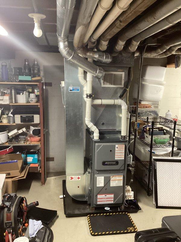Performed annual heating maintenance on 8-year-old ENE furnace (warranty through 2027). Utilized borescope inspection to identify significant corrosion and buildup in heat exchanger. Cleaned flame sensor per service requirements. System operational but noted substantial internal deterioration requiring monitoring.