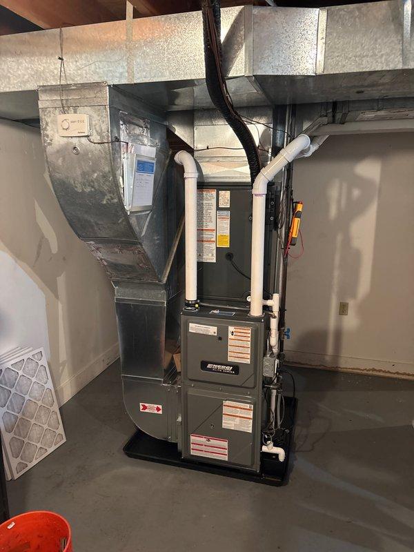 Completed installation of new furnace and air conditioning system in residential property. New AC unit was properly mounted on concrete pad with electrical connections secured to exterior of home. High-efficiency furnace was installed in utility area with all required ductwork, PVC venting, and drainage components correctly connected and tested for proper operation.