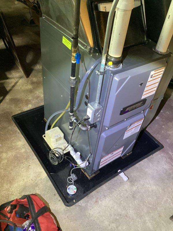 Responded to a water leak complaint from customer's furnace system. Upon inspection, identified condensate drainage issue from the 3-year-old Energy furnace. Repaired damaged condensate line and verified proper drainage, ensuring the heating system continued to function correctly with no further leakage.