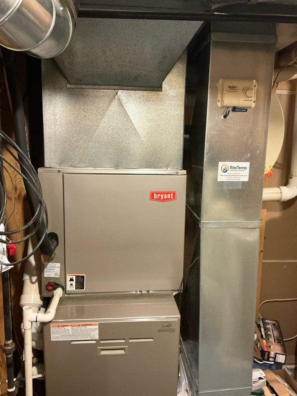 Conducted a comprehensive furnace evaluation for a potential replacement, examining the existing Payne gas furnace and Bryant system components. Documented the current installation setup including ductwork configuration, ventilation piping, and control systems through detailed photos. Assessment focused on determining appropriate replacement options while maintaining compatibility with existing HVAC infrastructure.