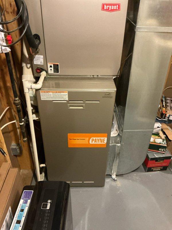 Conducted a comprehensive furnace evaluation for a potential replacement, examining the existing Payne gas furnace and Bryant system components. Documented the current installation setup including ductwork configuration, ventilation piping, and control systems through detailed photos. Assessment focused on determining appropriate replacement options while maintaining compatibility with existing HVAC infrastructure.