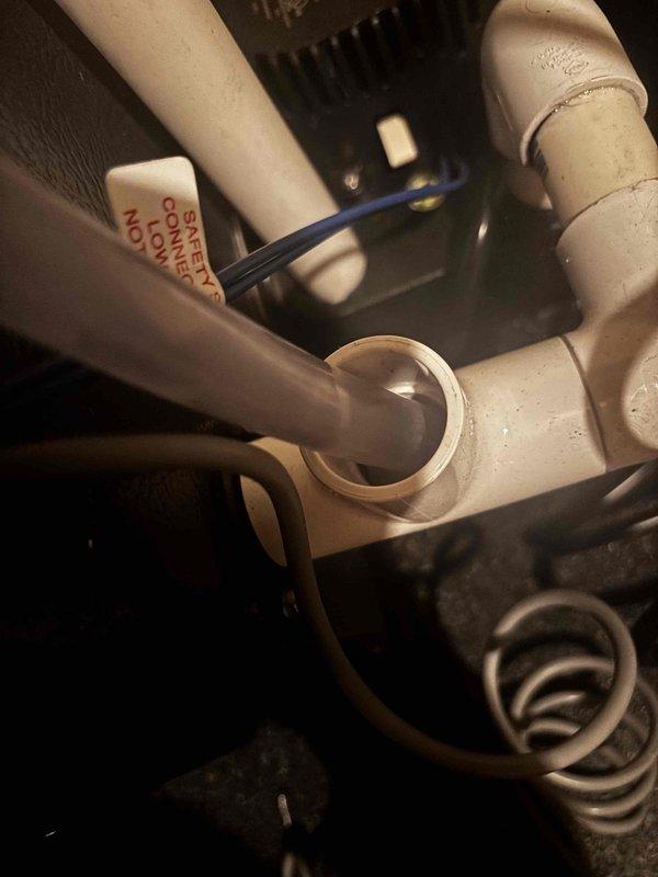 Performed annual heating service on a furnace system with no humidifier present. Inspected PVC venting connections and drain assembly for proper installation and condition. Examined furnace unit including safety components, gas valve, and warning systems. System is functioning properly with no issues identified.