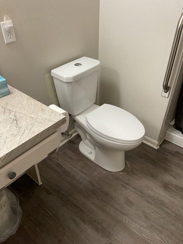 Successfully completed the quoted repair by installing customer-supplied faucet in kitchen area with stainless steel sink basin and marble countertop, ensuring proper function with no leaks. Also installed customer-supplied toilet in bathroom with wood-look flooring and grab bar, testing for proper flushing and secure mounting.