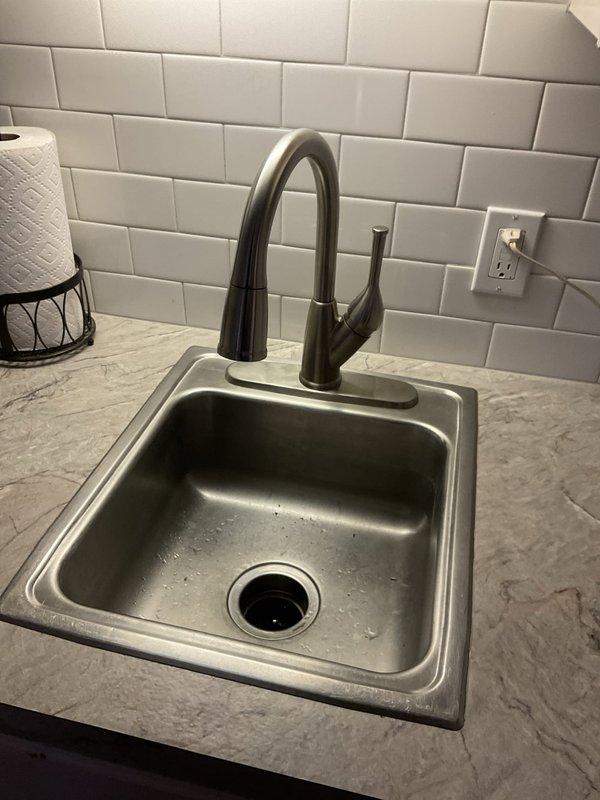 Successfully completed the quoted repair by installing customer-supplied faucet in kitchen area with stainless steel sink basin and marble countertop, ensuring proper function with no leaks. Also installed customer-supplied toilet in bathroom with wood-look flooring and grab bar, testing for proper flushing and secure mounting.