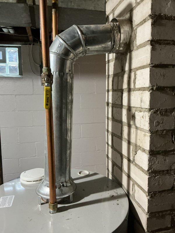 Completed FSTU on 16-year-old Bryant furnace system with comprehensive inspection and testing. Water heater inspection revealed normal operation with exhaust temperature reading of 139.8°F at the vent pipe. Both units are functioning properly with no immediate concerns identified.