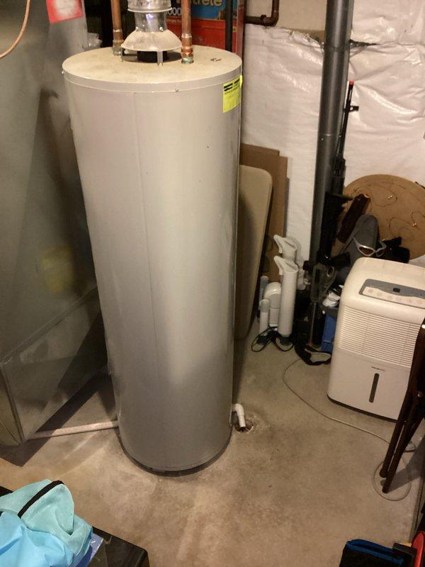Conducted on-site water heater estimate for replacement of existing JetGlas unit. Inspected current installation, which includes copper supply/return lines and appears to be positioned in utility room on concrete slab. Documented condition of unit and surrounding plumbing components to provide accurate replacement options.