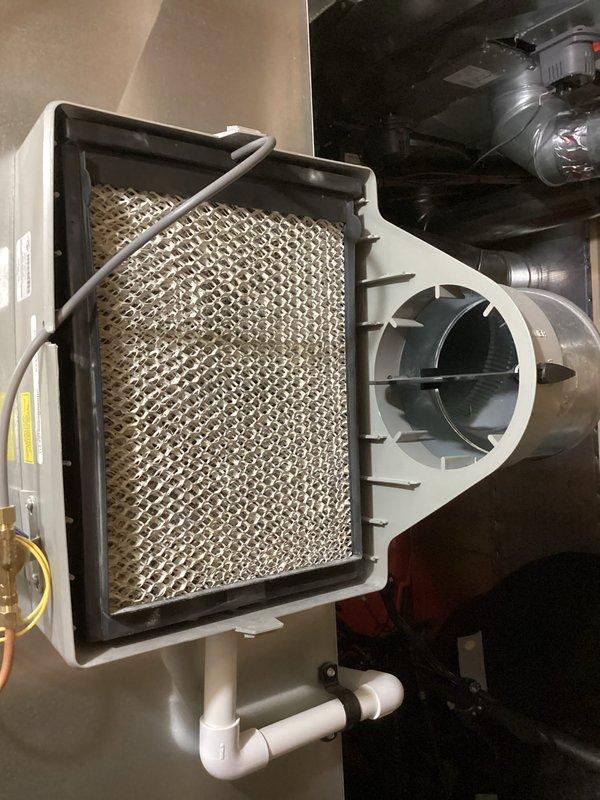Performed annual heating maintenance on 9-year-old Trane furnace. Inspected and cleaned filter housing, examined blower motor, checked electrical connections, and verified proper venting of PVC intake/exhaust configuration. System operating within normal parameters; recommended regular filter replacement to maintain efficiency.
