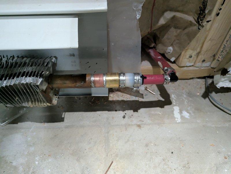 Completed QUOTR-quoted repair by replacing multiple SharkBite fittings on copper supply lines in the basement structural area. Removed compromised connections and installed new fittings, securing the piping properly to the wooden joists with appropriate brackets to ensure stable operation of the plumbing system that serves the radiator/heat exchanger unit.