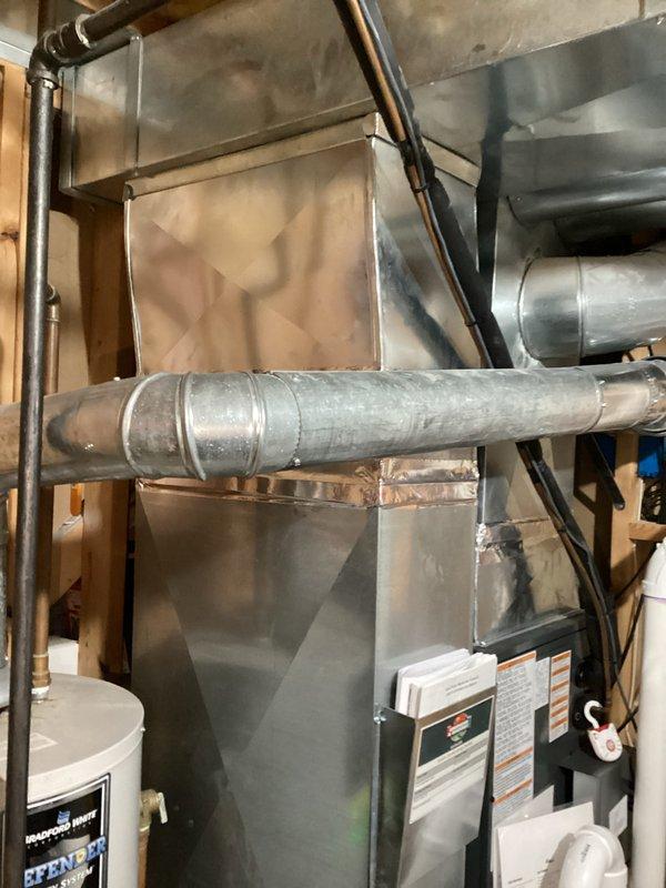 Conducted a water heater replacement estimate for a 20-year-old unit in a home of the same age. Documented current installation conditions including existing HVAC components, ductwork, plumbing connections, and surrounding insulation to determine proper replacement specifications. Photos were taken of the mechanical room layout to support the estimate preparation.