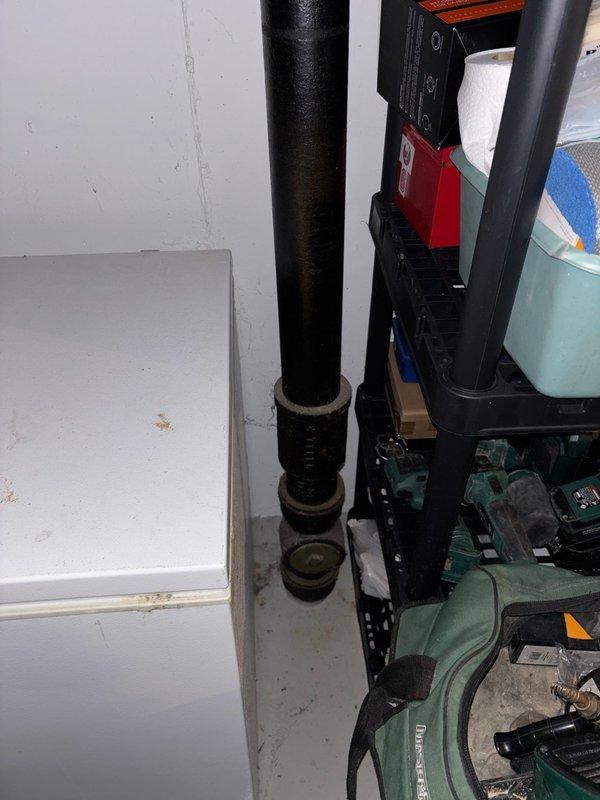 Responded to toilet leak issue. Inspected plumbing system in basement, focusing on waste line connections and vertical drainage pipes. Repaired leak, restored proper functionality, and verified system integrity, eliminating need for temporary bucket flushing solution.