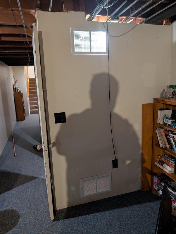 Completed corrections on water heater installation following inspector's rejection. Addressed all three code violations by: clearing the 24" service area in front of the unit, relocating the gas cock to an accessible position, and installing proper combustion air venting to meet code requirements.