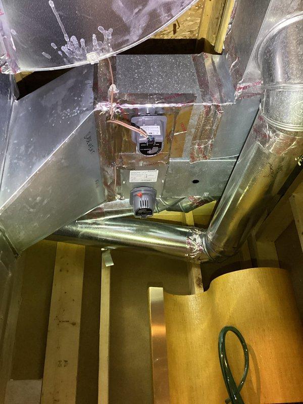 Completed annual heating maintenance on Heil furnace (0 years old). Inspected ductwork connections and sealing in attic space, noting proper foil tape application at joints. Verified operation of Honeywell control module (M2311) with all indicator lights functioning normally.