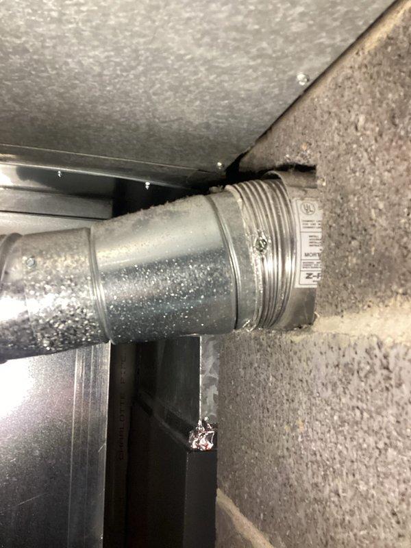 Responded to a service call for an 11-year-old Bradford White water heater that was not heating. Upon inspection, found pilot light issues in the basement utility area. Serviced the pilot assembly and verified proper operation of the water heater before completion.
