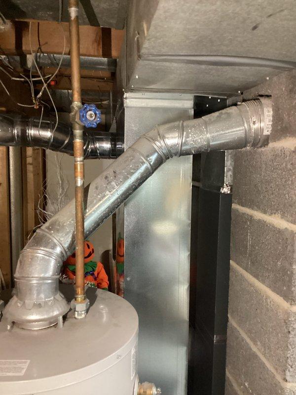 Responded to a service call for an 11-year-old Bradford White water heater that was not heating. Upon inspection, found pilot light issues in the basement utility area. Serviced the pilot assembly and verified proper operation of the water heater before completion.