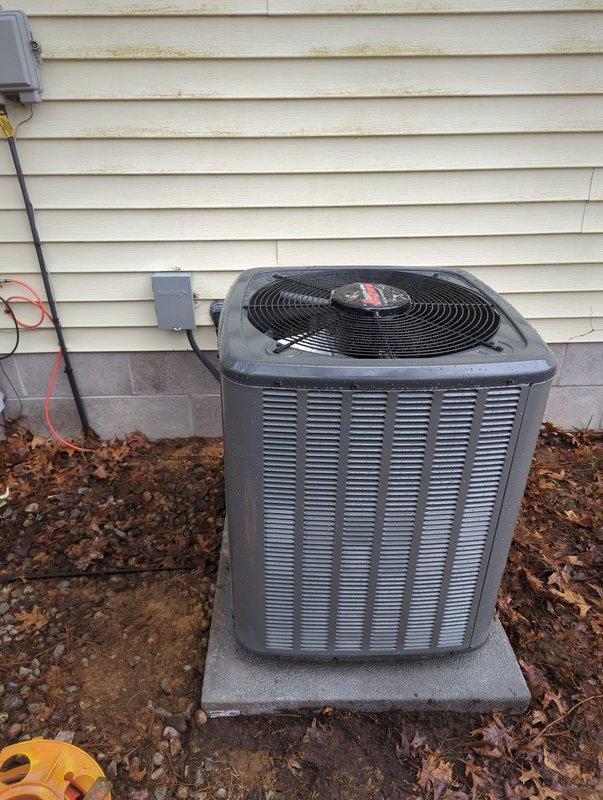 Completed installation of new furnace and AC system. Installed outdoor condenser unit on concrete pad with proper electrical connections. Mounted indoor furnace unit with professional ductwork including 90-degree bend and PVC piping for condensate drainage.