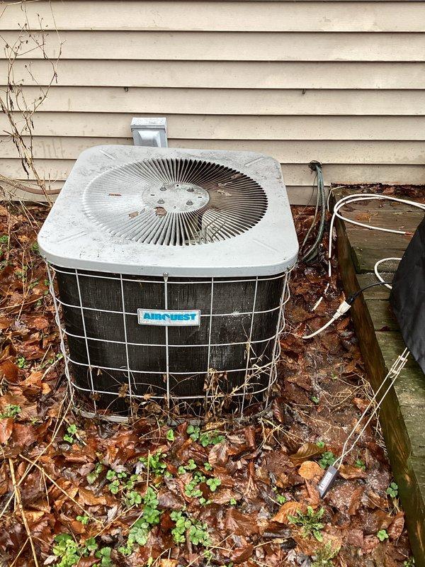 Responded to service call regarding severed AC line. Upon inspection, found Airquest outdoor unit (approximately 24 years old) with disconnected refrigerant line that had been accidentally cut during previous service work. Evaluated damage and performed necessary repairs to restore system functionality. Unit showed signs of age and weathering but was returned to operational status.
