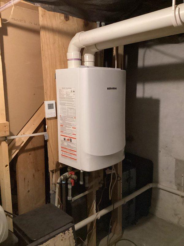 Performed annual heating tune-up on 13-year-old Lennox furnace for Comfort Club member. System was thoroughly inspected with no issues found. Equipment appears to be properly installed with appropriate venting and connections to the tankless water heater and humidifier components.