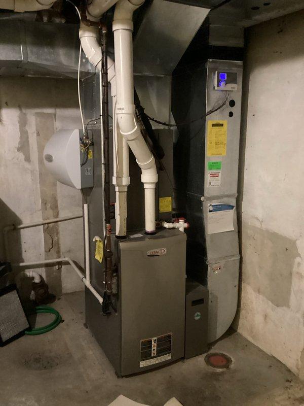 Performed annual heating tune-up on 13-year-old Lennox furnace for Comfort Club member. System was thoroughly inspected with no issues found. Equipment appears to be properly installed with appropriate venting and connections to the tankless water heater and humidifier components.