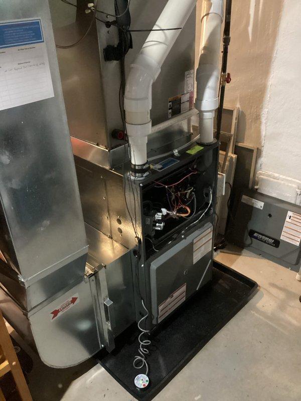 Completed complimentary annual furnace tune-up on EnergiAir WT 01-2036 unit (0 years old) with humidifier. System inspected thoroughly with front panel removed to check internal components. Furnace currently operating properly with no issues identified. Customer has been informed of proper system function and maintenance completed.