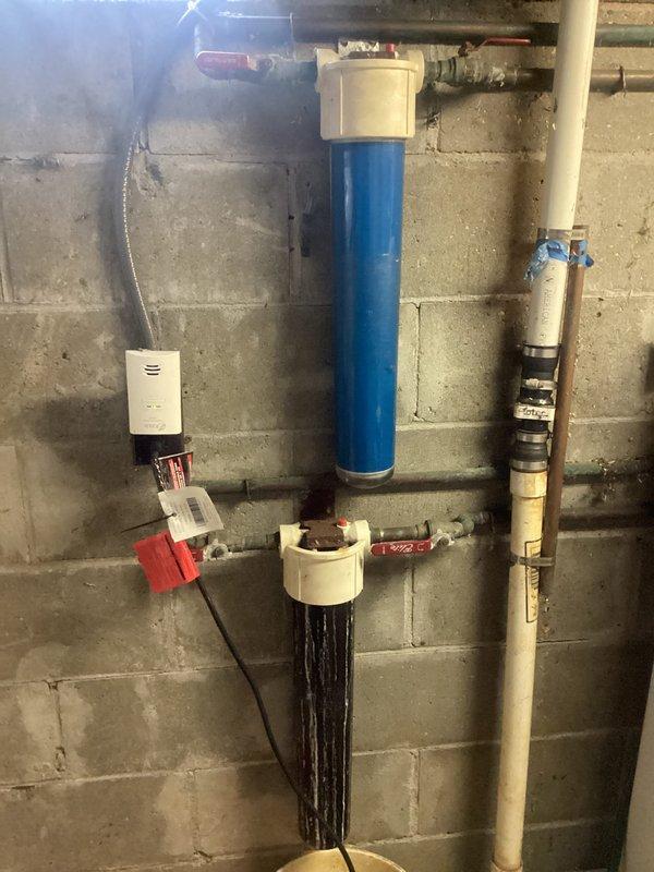 Conducted comprehensive site assessment for potential replacement of aging mechanical systems including 25+ year old boiler (requiring annual repairs for past 5-6 years), 10-year-old water heater, and 22+ year-old water softener. Evaluated existing plumbing configuration, documenting disorganized pipe layout requiring complete rework. Provided customer with detailed estimate options for: 1) combi boiler system, 2) tankless boiler with separate tankless water heater, and 3) water softener replacement with complete replumbing of mechanical area.