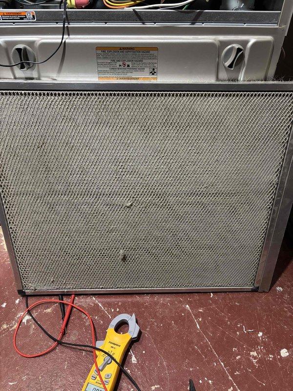 Completed annual maintenance on 6-year-old Carrier furnace with humidifier. System operating normally upon arrival; performed standard tune-up procedures including drain pan cleaning and filter inspection. Electrical connections tested with multimeter and verified within specifications. No issues identified; system left in proper working condition.