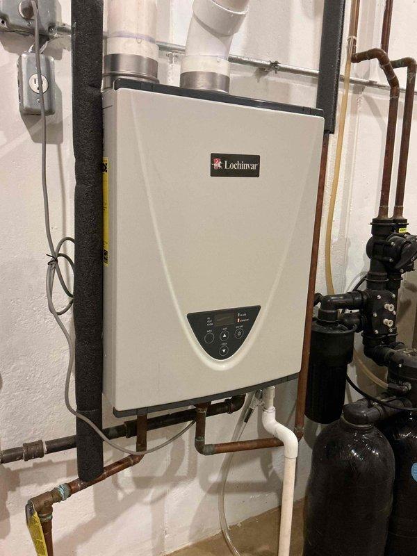 Diagnosed and repaired a 5-year-old Lochinvar tankless water heater that was producing noise during operation. Inspection revealed significant corrosion and oxidation at copper pipe connections, particularly at joints where slow leaks had developed. Cleaned corroded fittings, replaced damaged pipe sections, and resealed connections to eliminate noise and prevent further water damage.