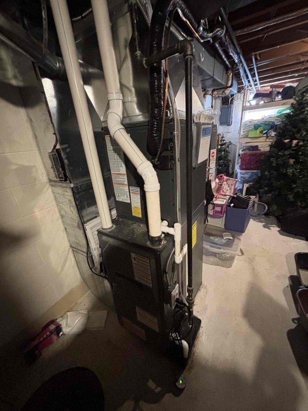 Successfully completed installation of a CAPFA2422B3 air conditioner system, replacing the previous unit as requested. The new system was properly connected to the existing furnace and ductwork in the basement utility area, with all appropriate electrical connections secured and system tested for proper operation.