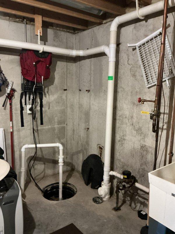 Diagnosed sump pump that was continuously running but not evacuating water properly. Inspected PVC discharge piping system and pump mechanism, determining the pump had failed. Replaced defective sump pump unit, tested new installation, and verified proper water evacuation and cycling.