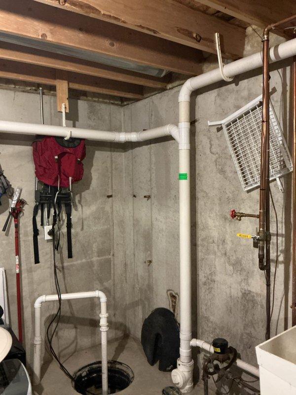 Diagnosed sump pump that was continuously running but not evacuating water properly. Inspected PVC discharge piping system and pump mechanism, determining the pump had failed. Replaced defective sump pump unit, tested new installation, and verified proper water evacuation and cycling.