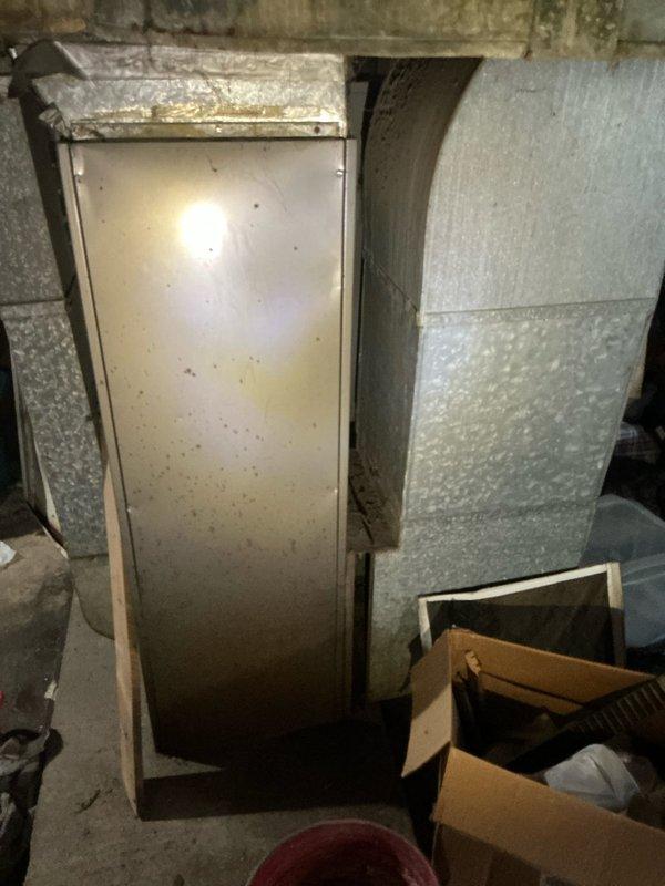 Conducted an estimate for a non-operational furnace in a basement utility room. Inspected the existing HVAC system, including the metal furnace cabinet, galvanized ductwork with insulation, and associated ventilation components. Documented the current installation with photographs to provide accurate replacement options.