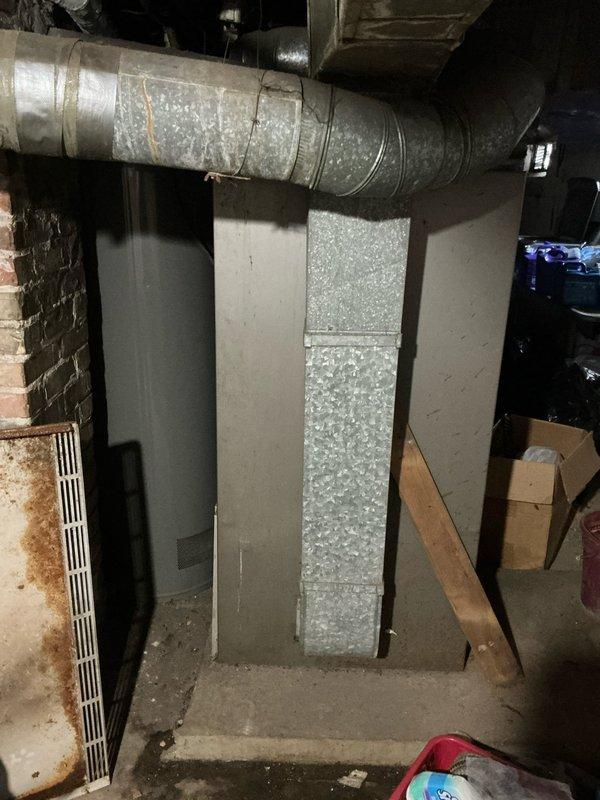 Conducted an estimate for a non-operational furnace in a basement utility room. Inspected the existing HVAC system, including the metal furnace cabinet, galvanized ductwork with insulation, and associated ventilation components. Documented the current installation with photographs to provide accurate replacement options.